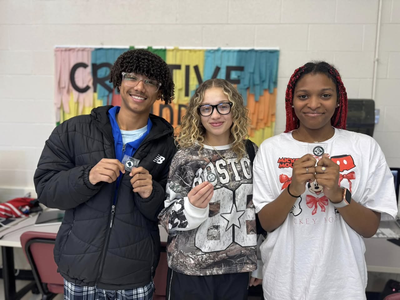 Honoring Tradition Through Design: CCPS Graphic Design Scholars Create Official Challenge Coin Honoring Tradition Through Design: CCPS Graphic Design Scholars Create Official Challenge Coin